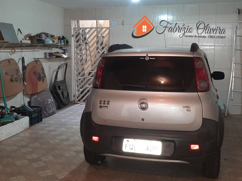 Sobrado com quatro dormitórios, três banheiros