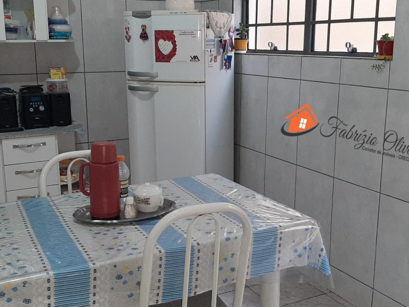 Sobrado com quatro dormitórios, três banheiros