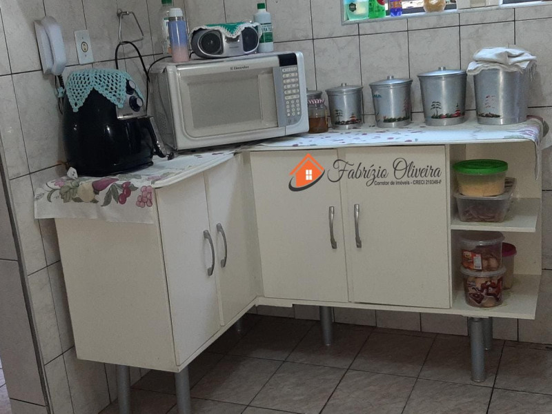 Sobrado com quatro dormitórios, três banheiros