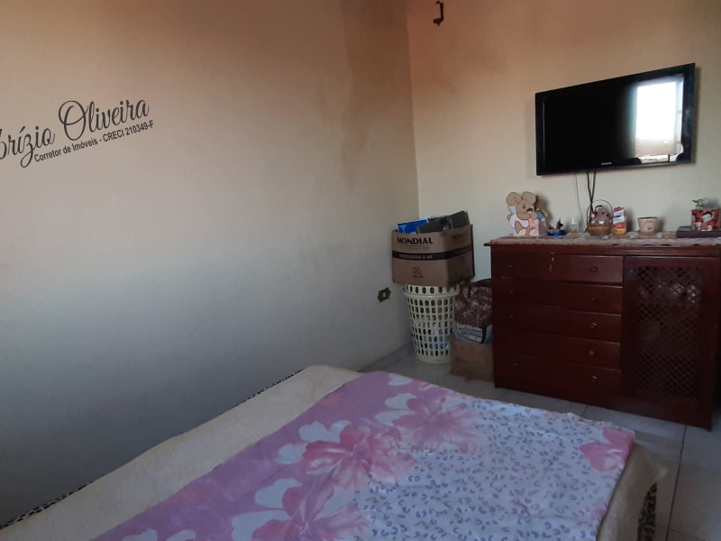 Sobrado com quatro dormitórios, três banheiros